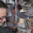 Technician Working on Furnace Parts | Canada HVAC